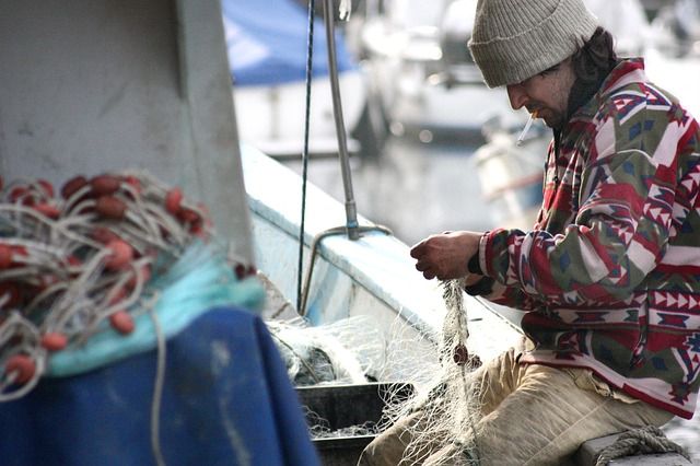 fisherman-with-red-of-fish